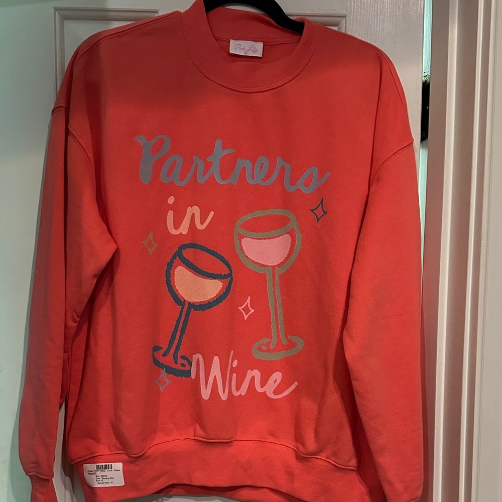 Pink Lily small gumdrop red sweatshirt. Partners In Wine logo. New